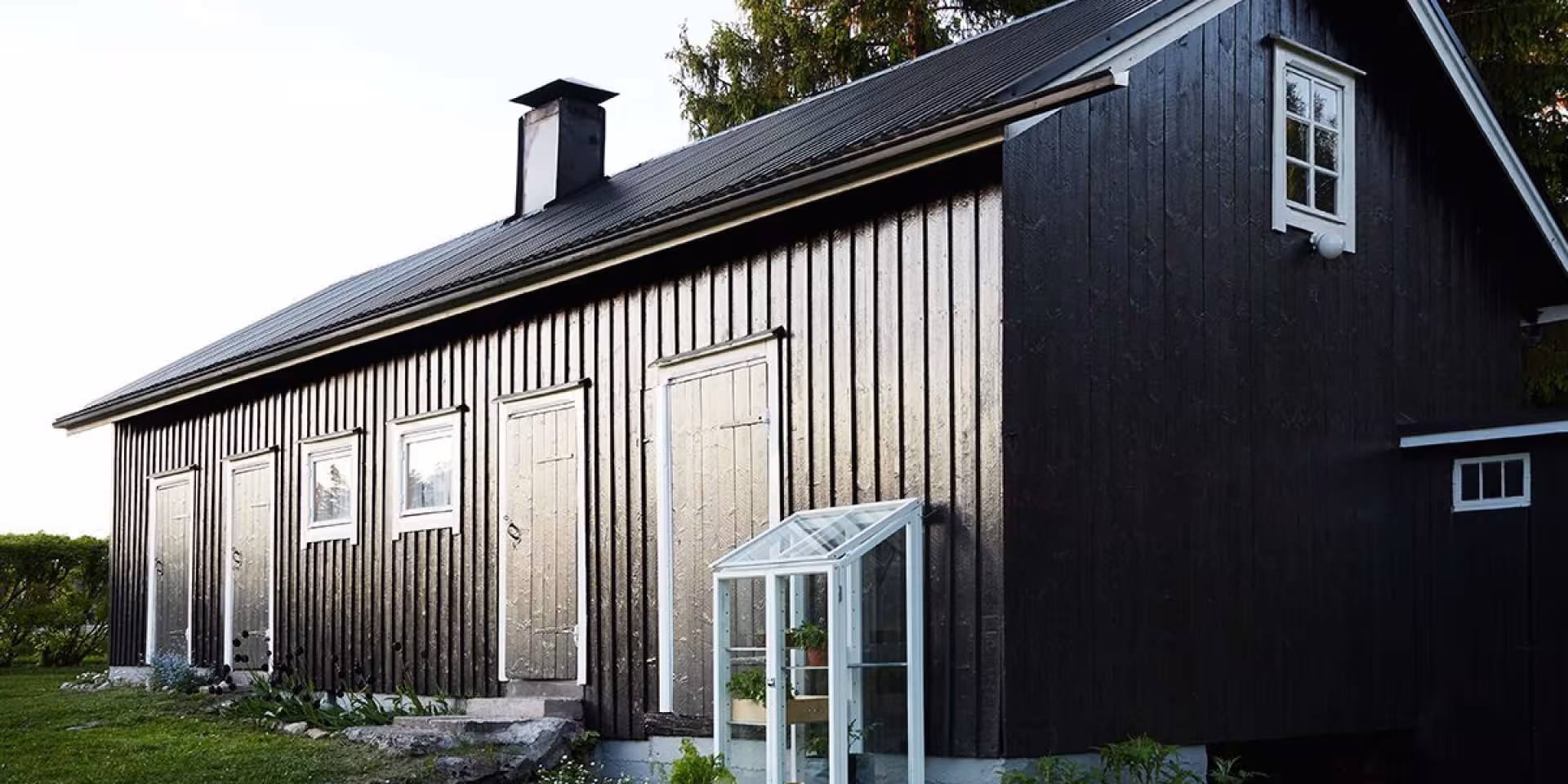 painting barn into black