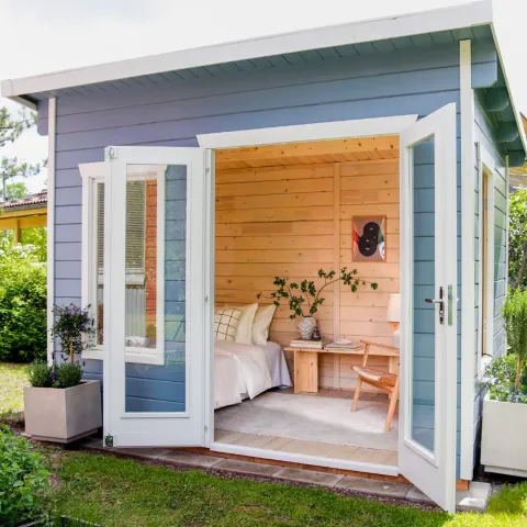 wooden garden cabin with soothing colours