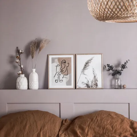 lilac colour wall and matching bed headboard