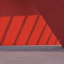Red wall with lights and shadows