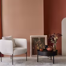 stylish living room with light brown and dark terracotta colour section