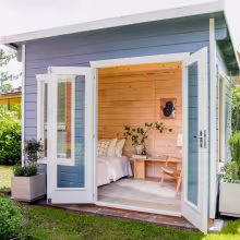 wooden garden cabin with soothing colours